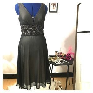 Sheer black lace dress with nude lining